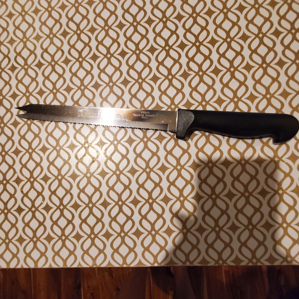 Tv knife 12 1/2 in surgical stainless steel I have 2 (1) new in the box,1 NWOB